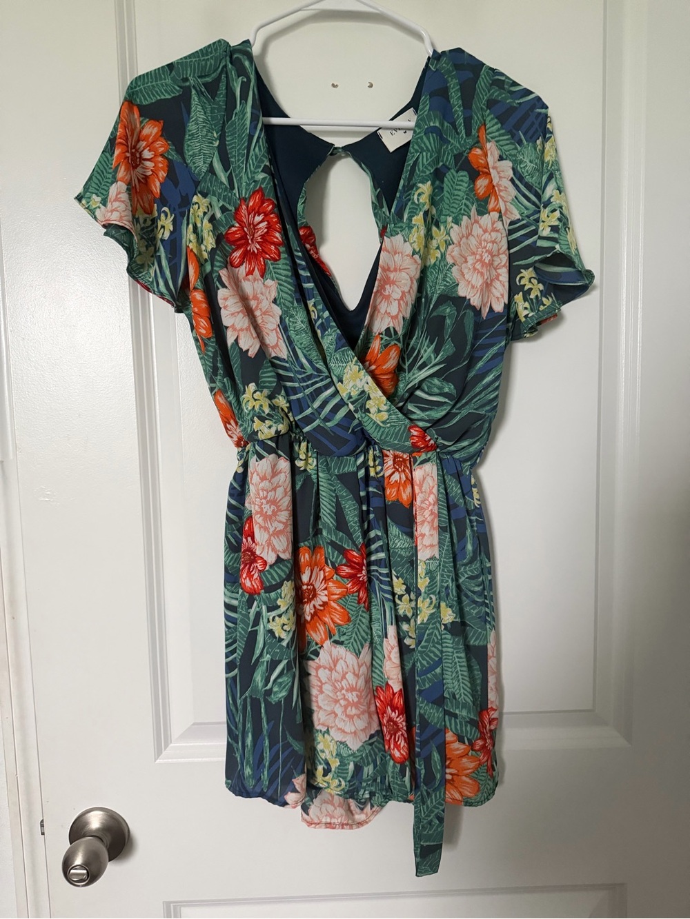 Everly Floral Short Sleeve Romper in Navy & Green with Coral Accents